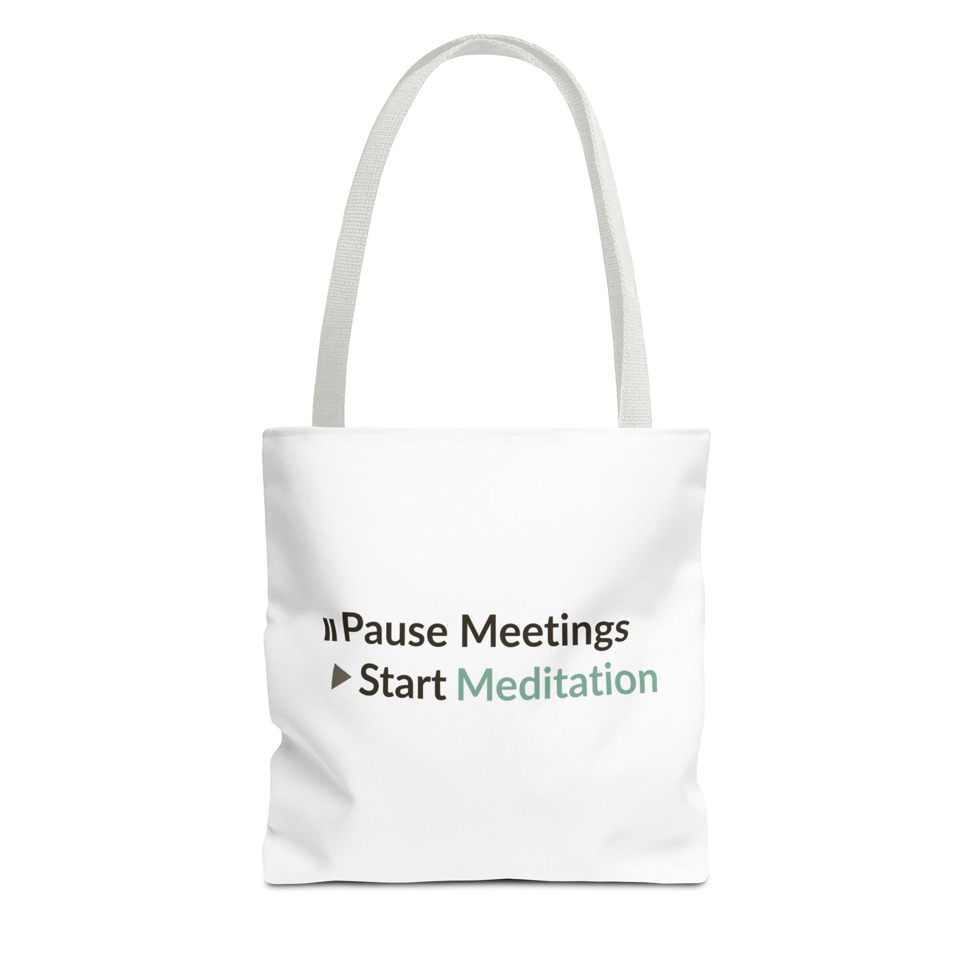 White handle tote bag with text 'Pause Meetings Start Meditation' on a white background