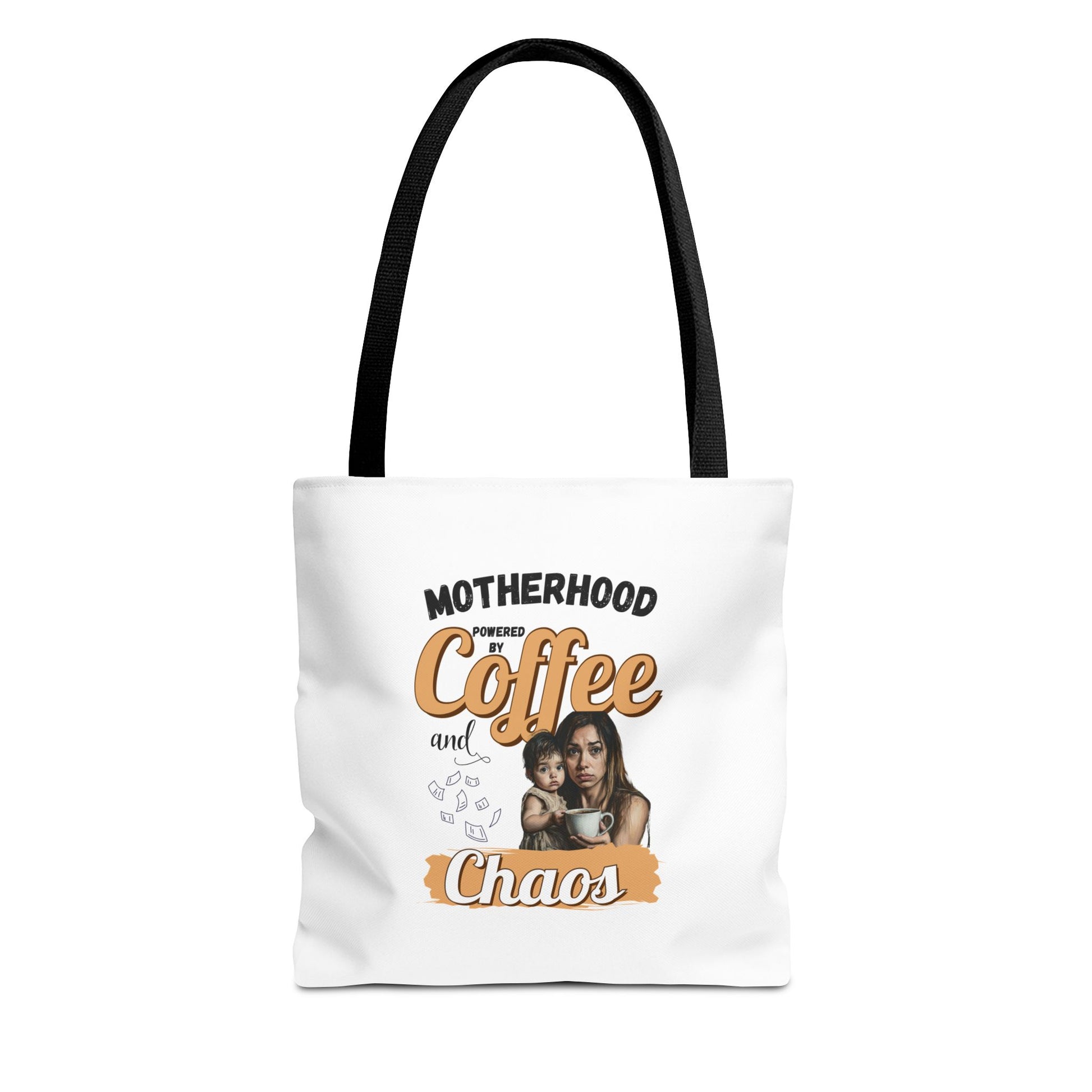Tote bag with black handle and 'Motherhood powered by Coffee and Chaos' text on a white background