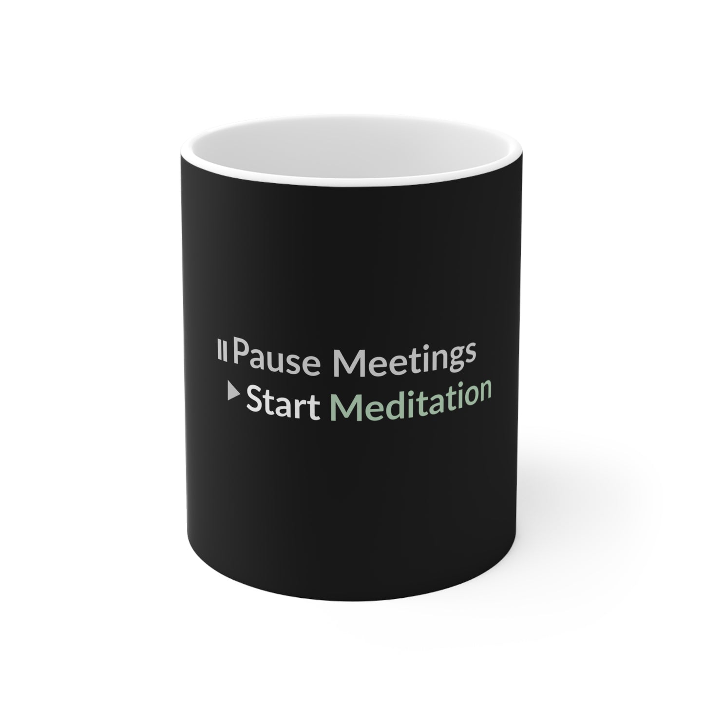 Black mug design with white text 'Pause Meetings Start Meditation' on a white background
