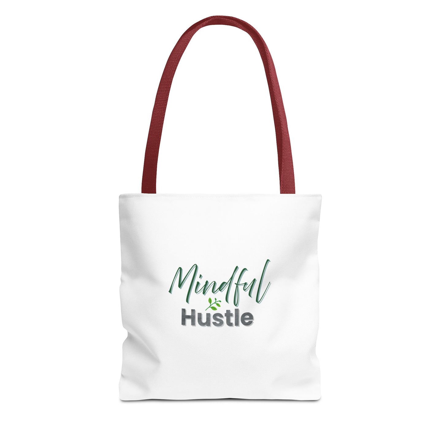 White tote bag with 'Mindful Hustle' text and red handles on a white background