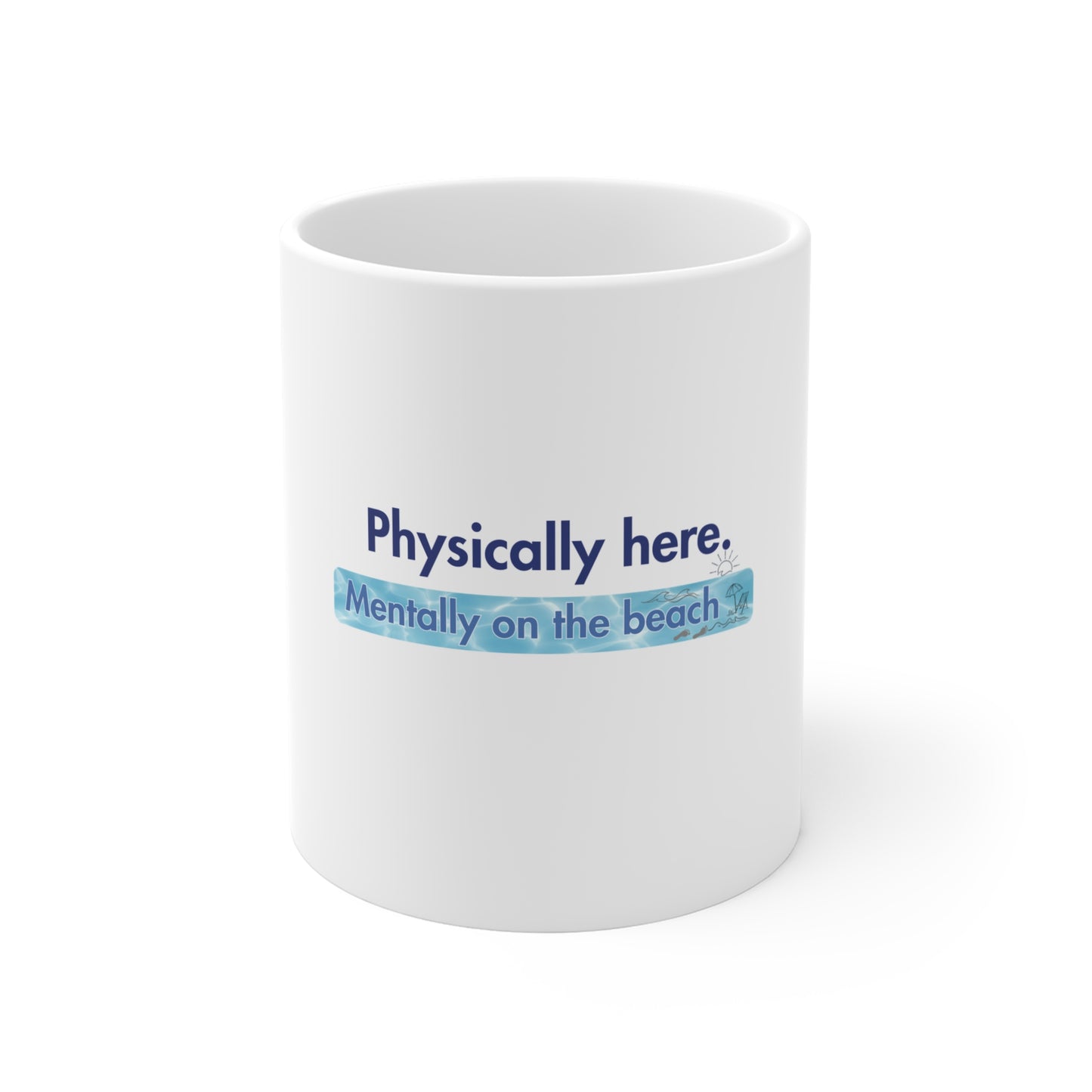 White mug with humorous text 'Physically here. Mentally on the beach' on a white background