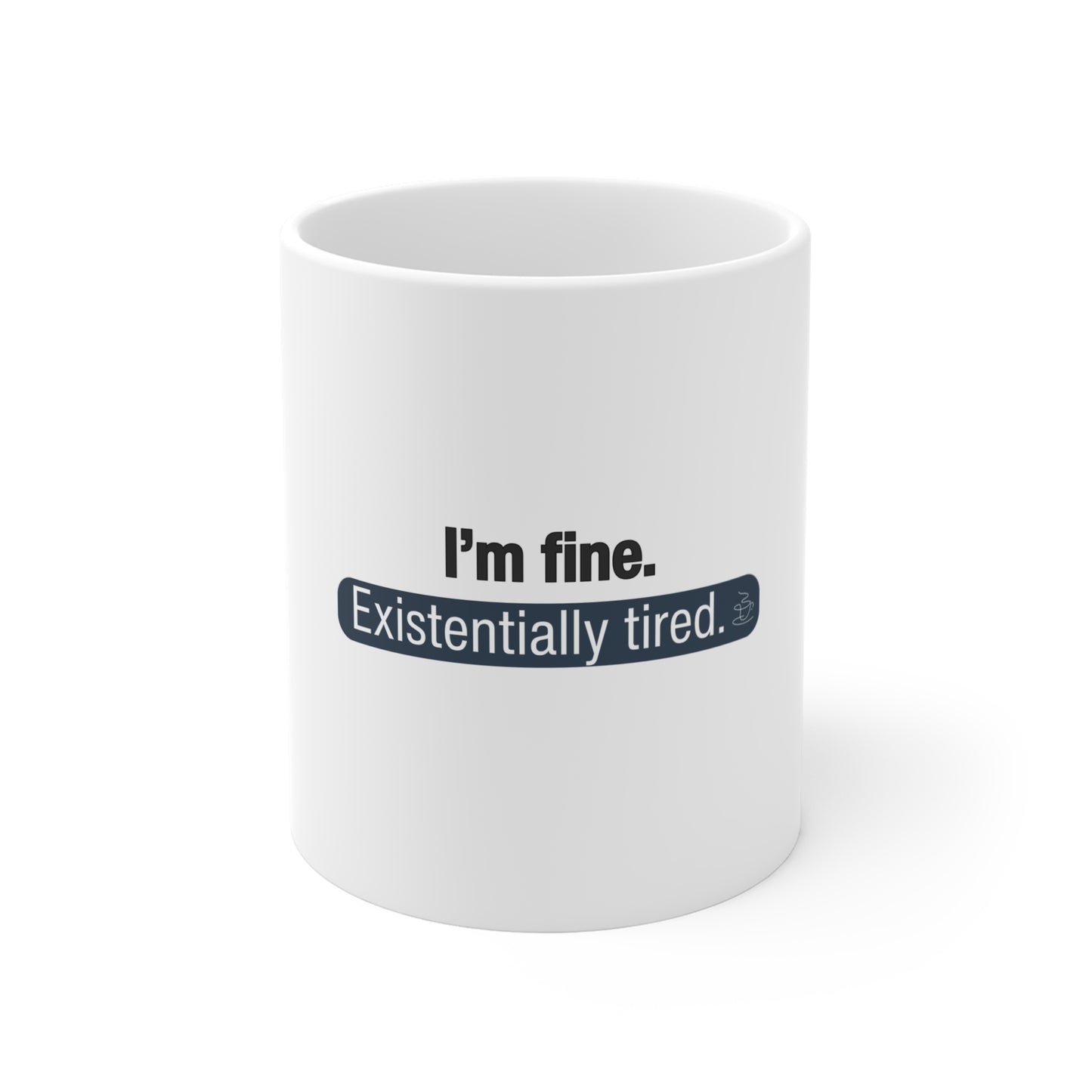 White mug with text 'I'm fine. Existentially tired.' on a white background