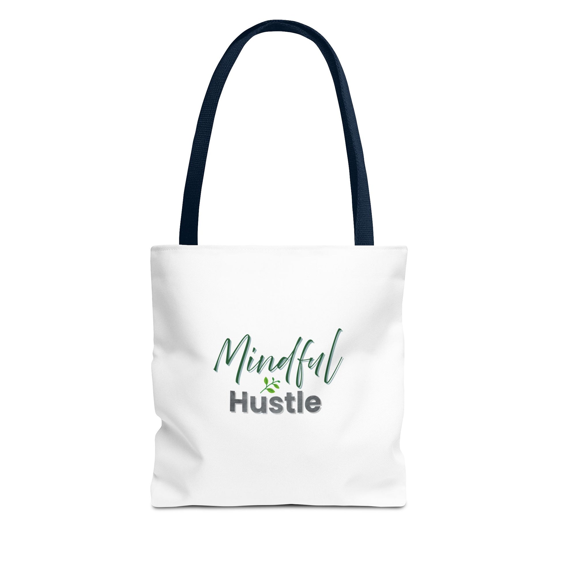 White tote bag with 'Mindful Hustle' text and navy handles on a white background