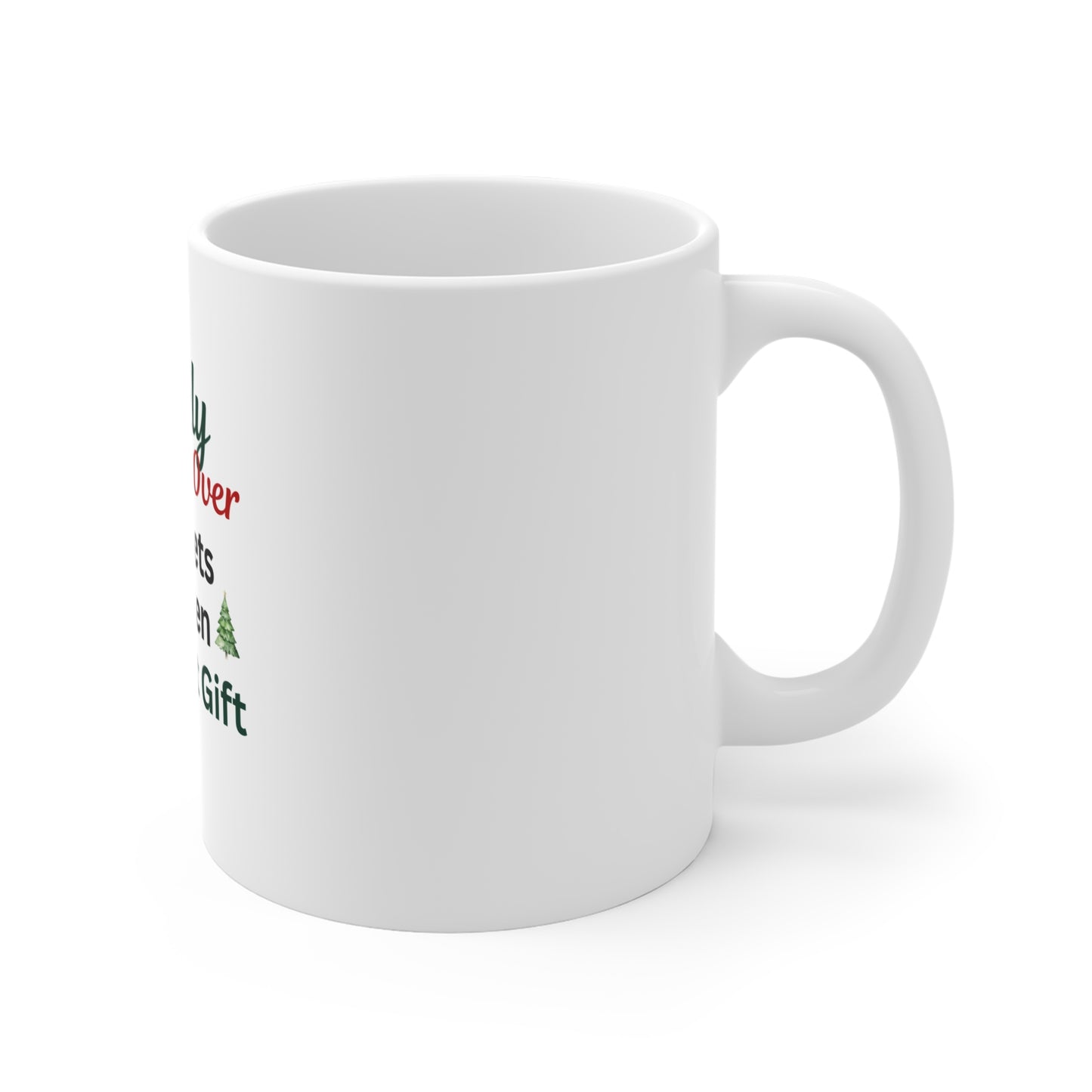 Right side view of white mug with text and a Christmas tree design on a white background