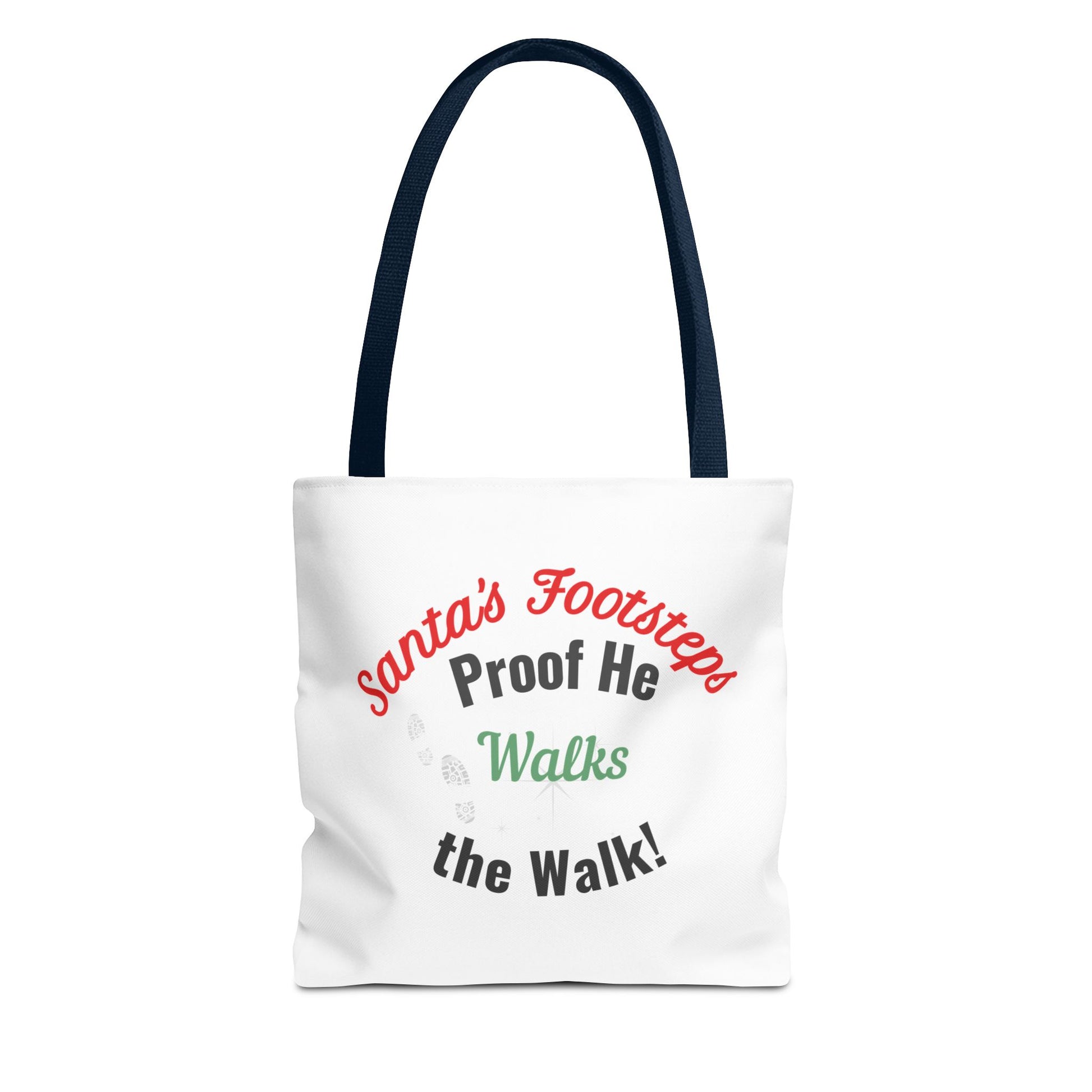 White tote bag with navy handle featuring humorous text 'Santa's Footsteps - Proof He Walks The Walk!' on a white background