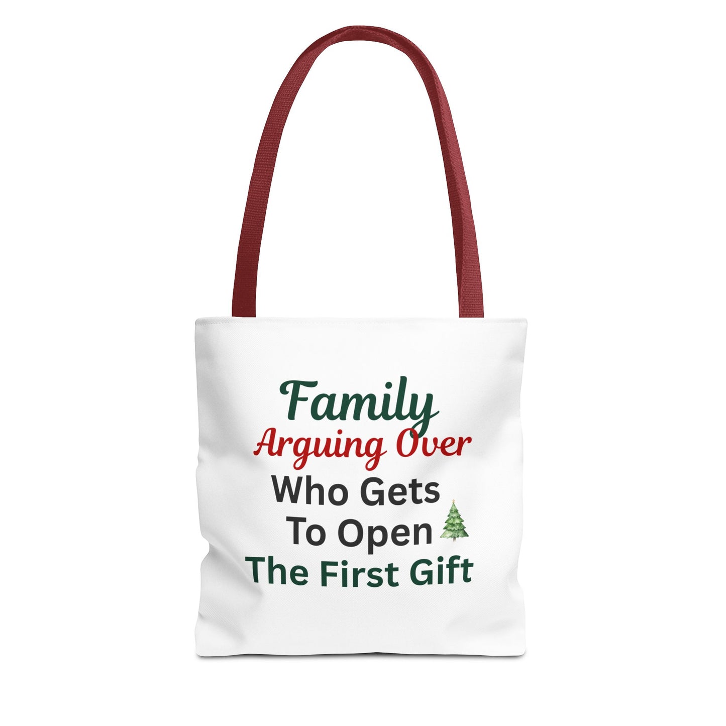 White tote bag with red handle and text 'Family Arguing Over Who Gets To Open The First Gift' on a white background