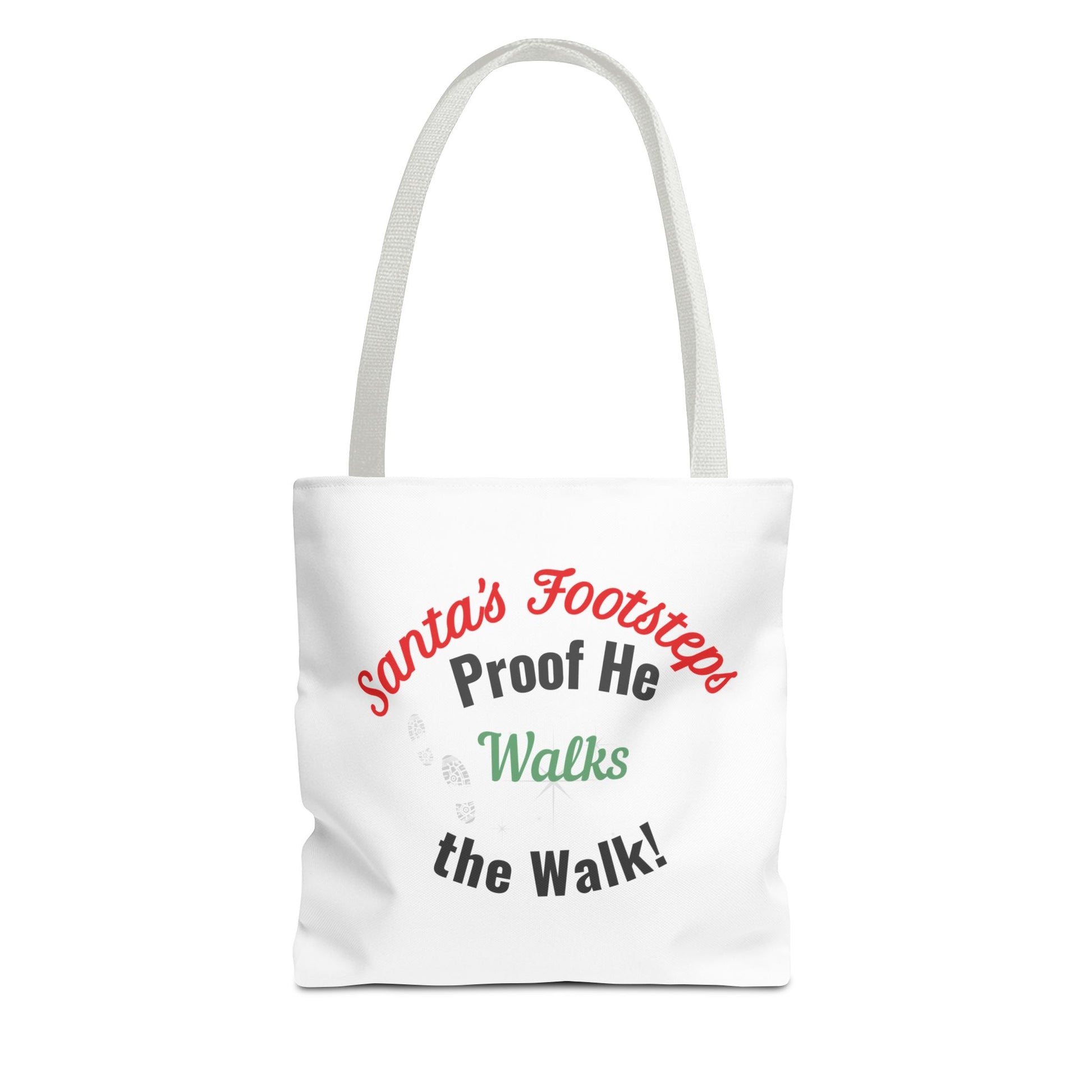 White tote bag with white handle featuring humorous text 'Santa's Footsteps - Proof He Walks The Walk!' on a white background