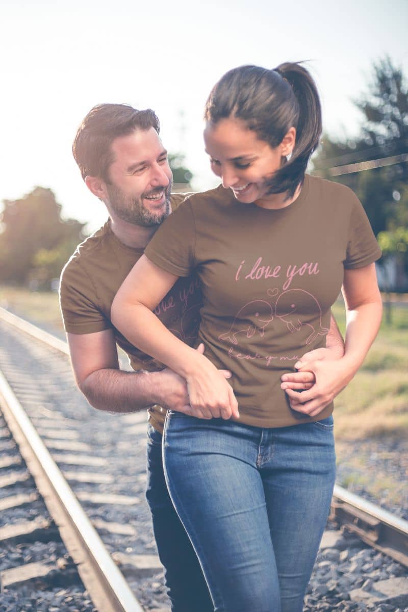 Adorable Dolphin love t-shirt With the couple laughing and happy together on the railway tracks