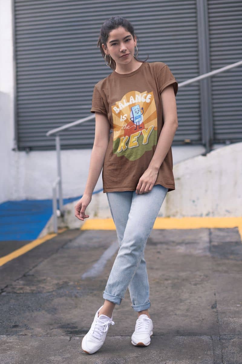 Balance is the key t-shirt with a girl posing on the stairs