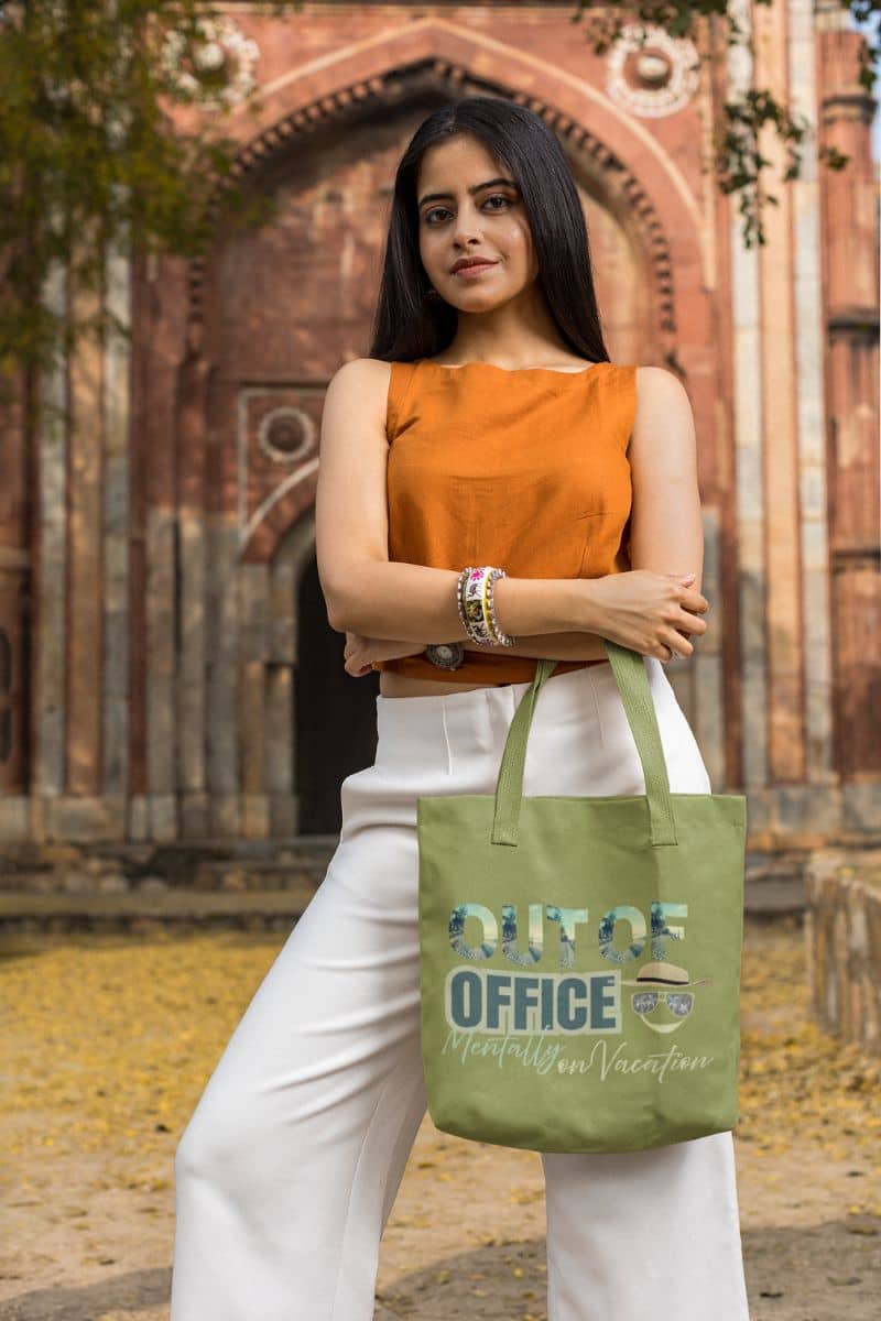 Beach tote bag with a girl posing in front of a temple