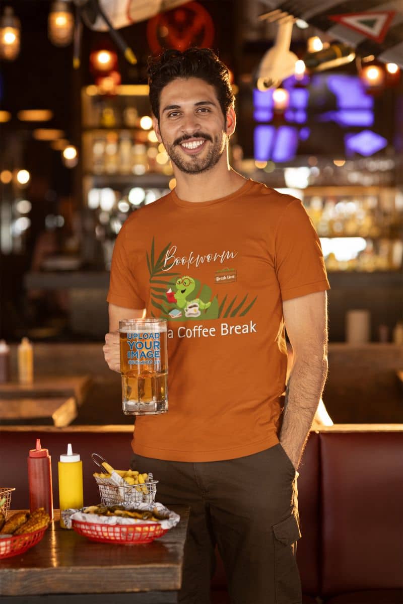 Bookworm coffee break t-shirt with a man holding a glass of beer in a restaurant