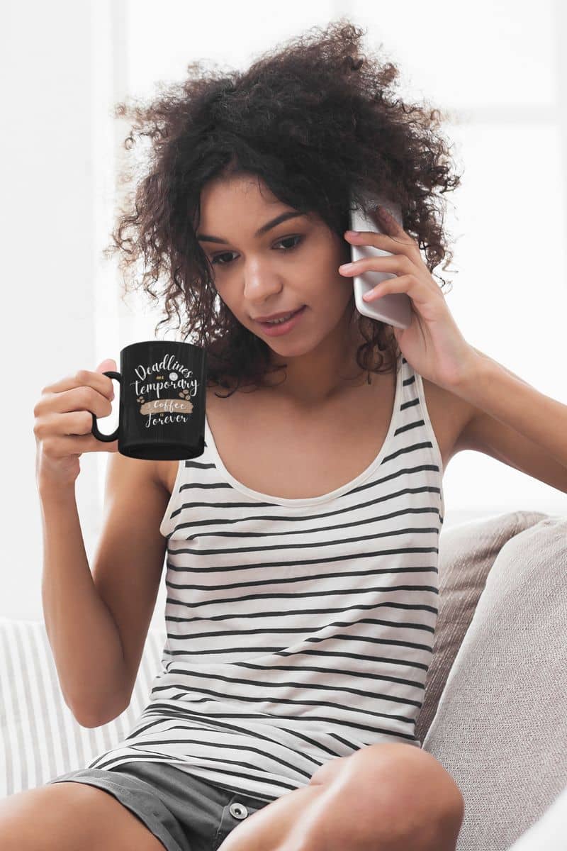 Charming coffee addict mug with a girl talking on the phone while holding a cup of coffee in her hand