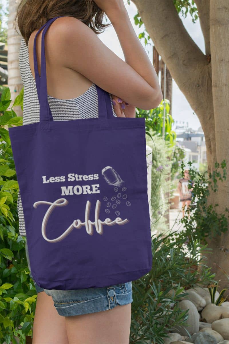 Coffee tote bag with a girl standing under the tree waiting for a car on the side of the road