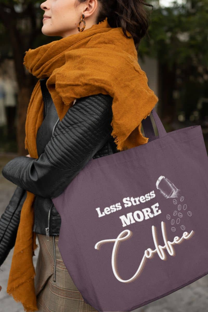Coffee tote bag with a stylish girl carrying a tote bag walking down the street