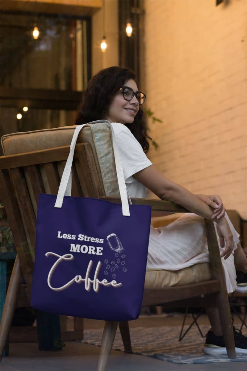 Coffee tote bag with a girl sitting on a chair with a bright smile