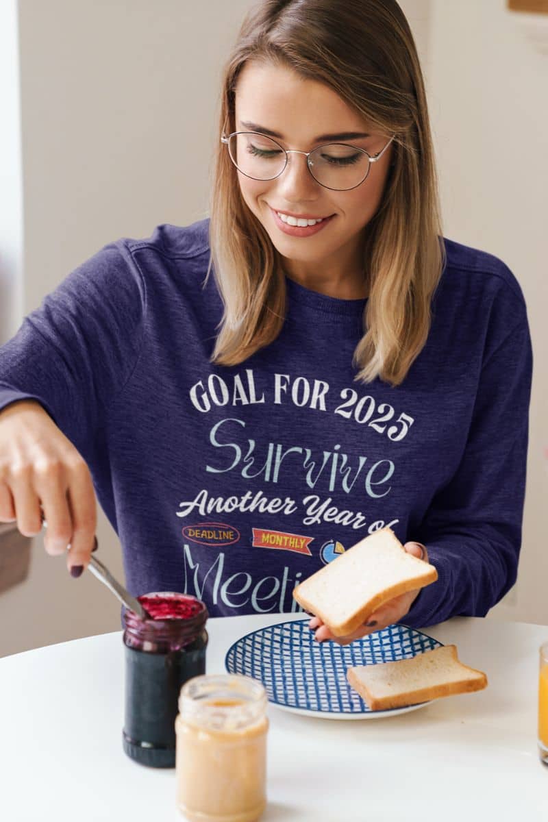 Comfy work sweatshirt with a girl preparing breakfast with bread and jam