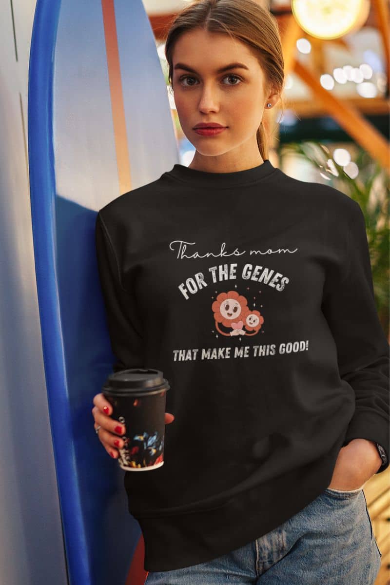 Cool sweatshirt with a beautiful girl leaning on a skateboard to pose while still holding a cup of coffee
