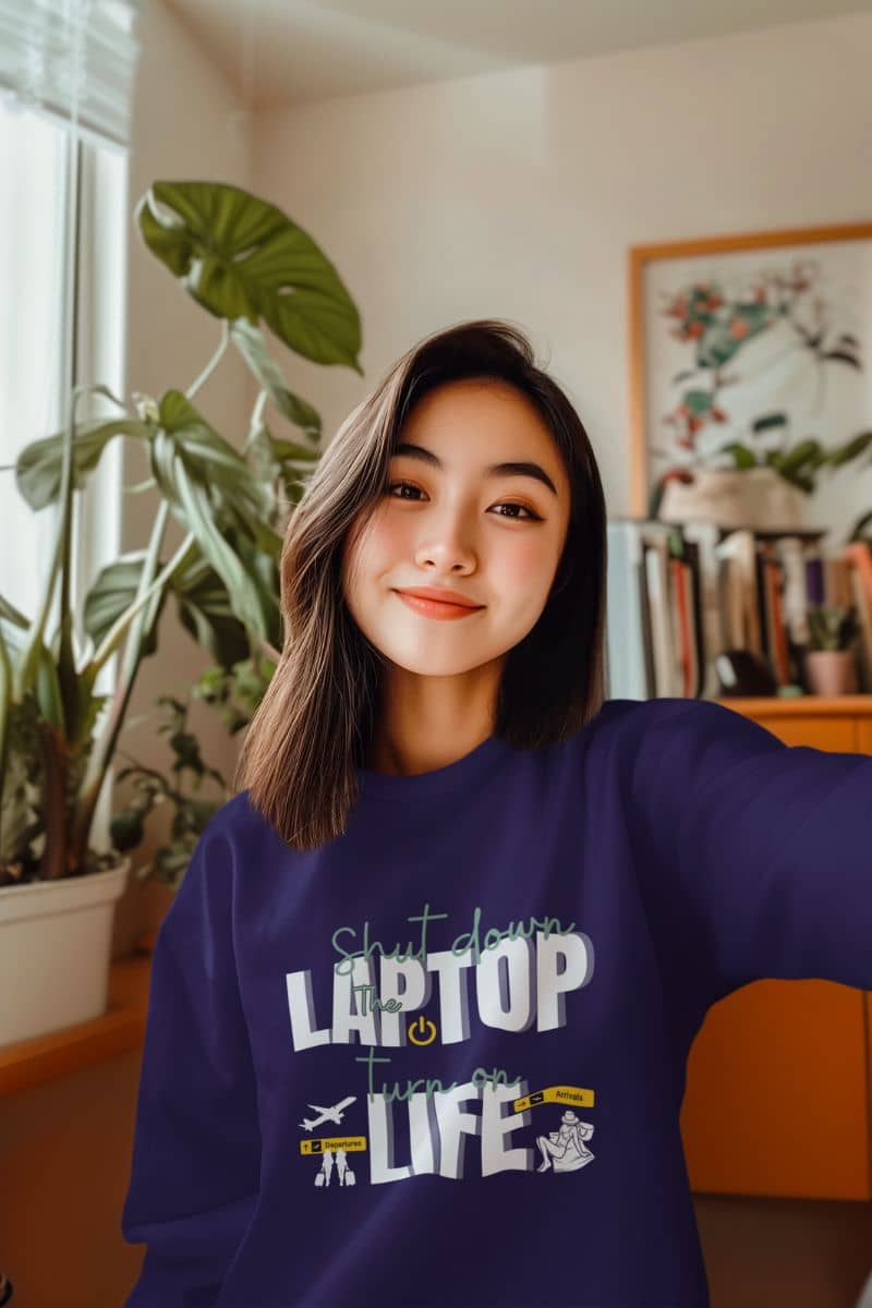 Cozy getaway sweatshirt with a girl taking a selfie in the living room