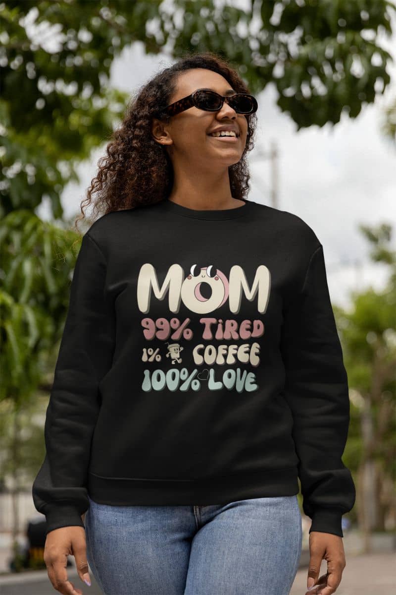 Cozy mom sweatshirt with a woman posing on the street