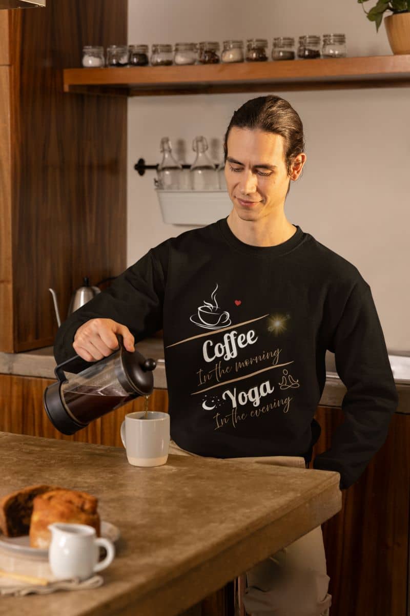 Cozy pullover sweatshirt with a man pouring coffee into a cup in the kitchen