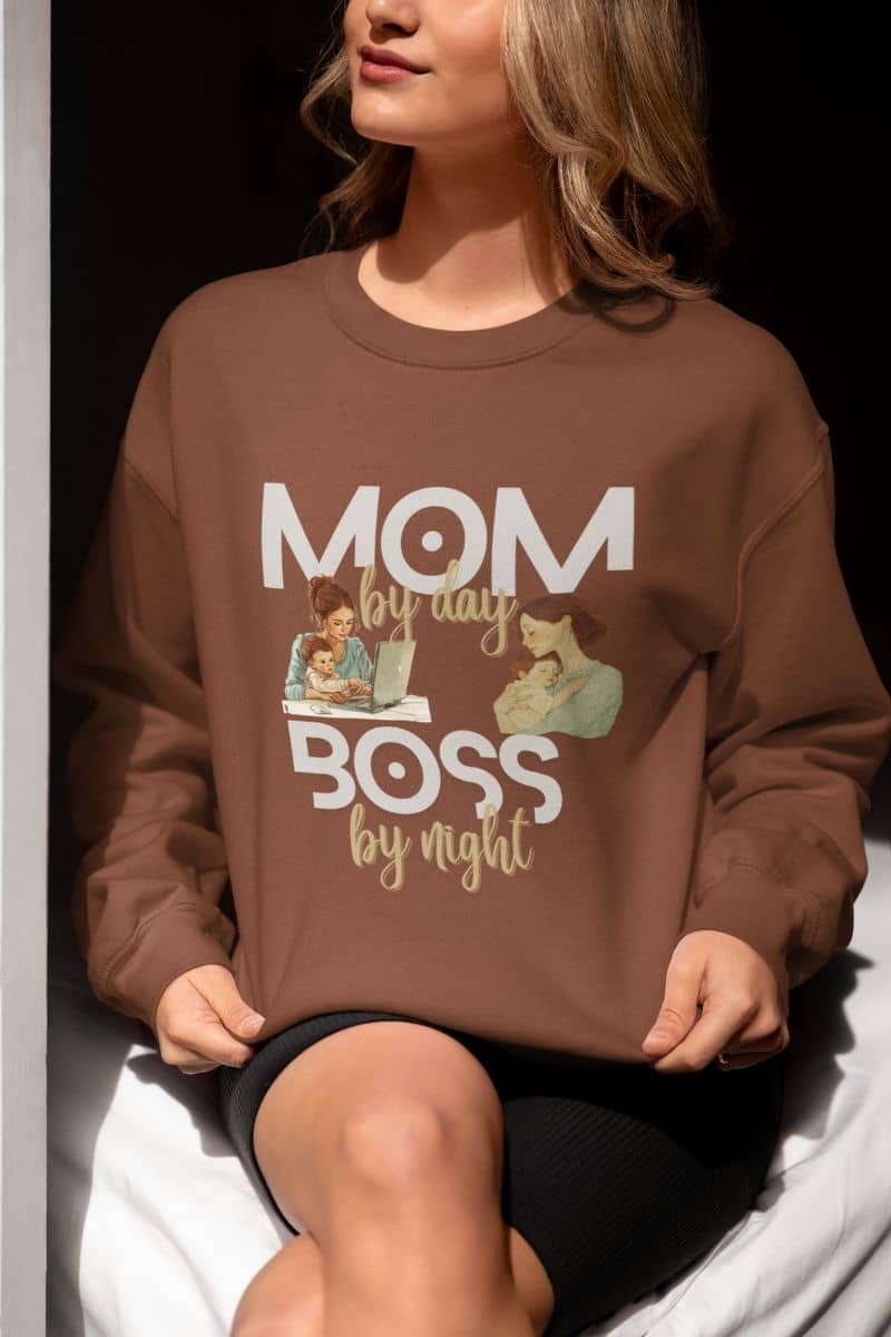 Cozy sweatshirt for moms with a girl sitting posing on a chair