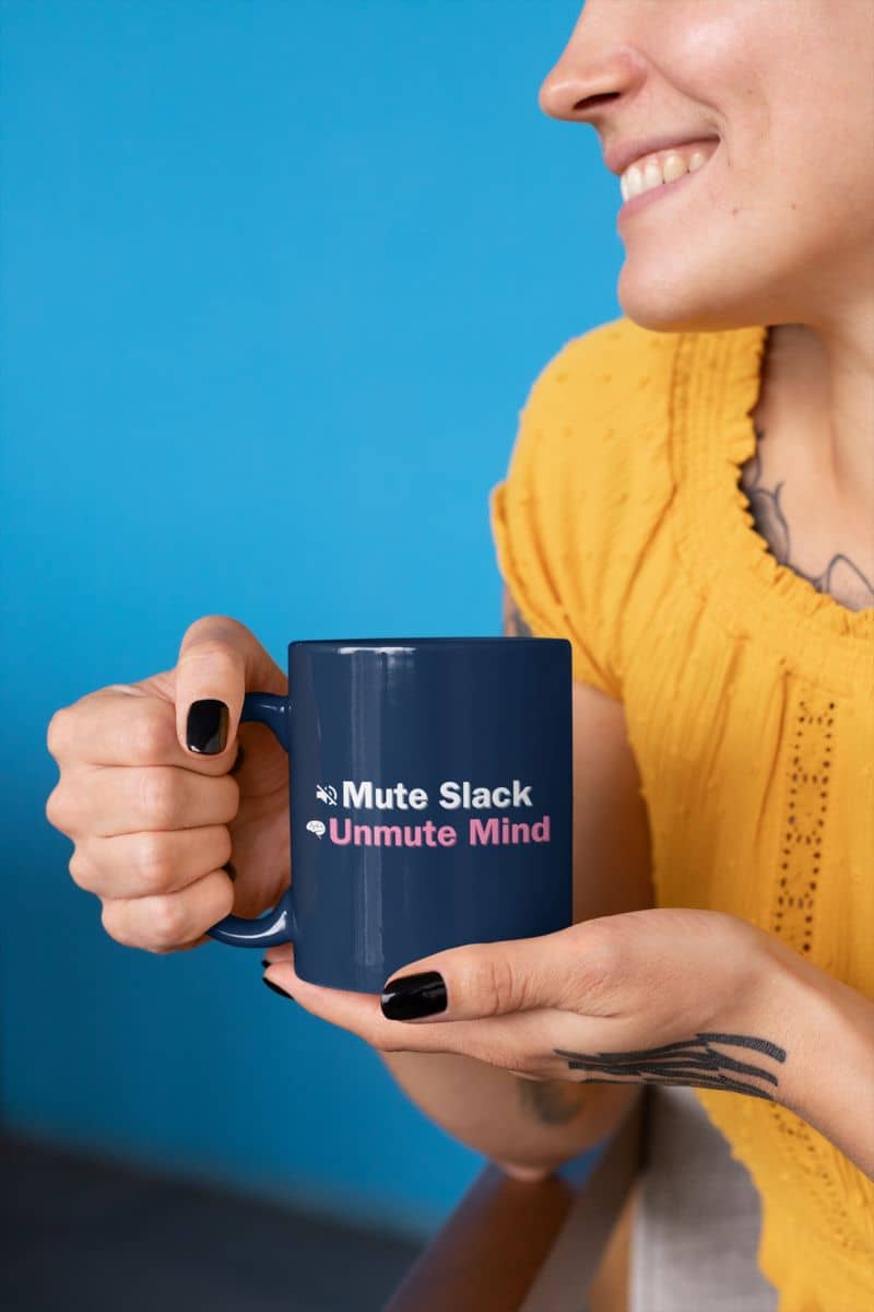 Empowerment quote mug for work with a person holding a blue mug with text against a blue background