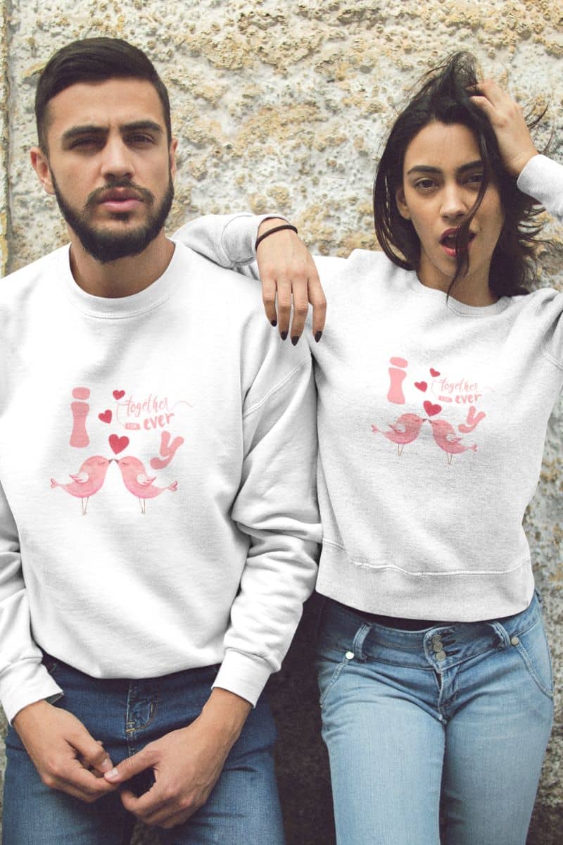Eternal love birds sweatshirt with a couple posing against an old wall