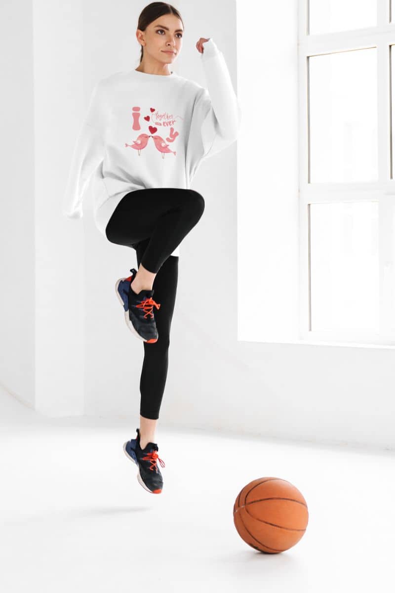 Eternal love birds sweatshirt with a girl dancing in the house with a ball on the floor