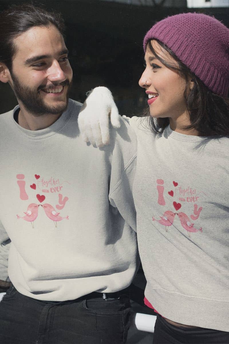 Eternal love birds sweatshirt with a couple sitting talking to each other and giving each other affectionate looks