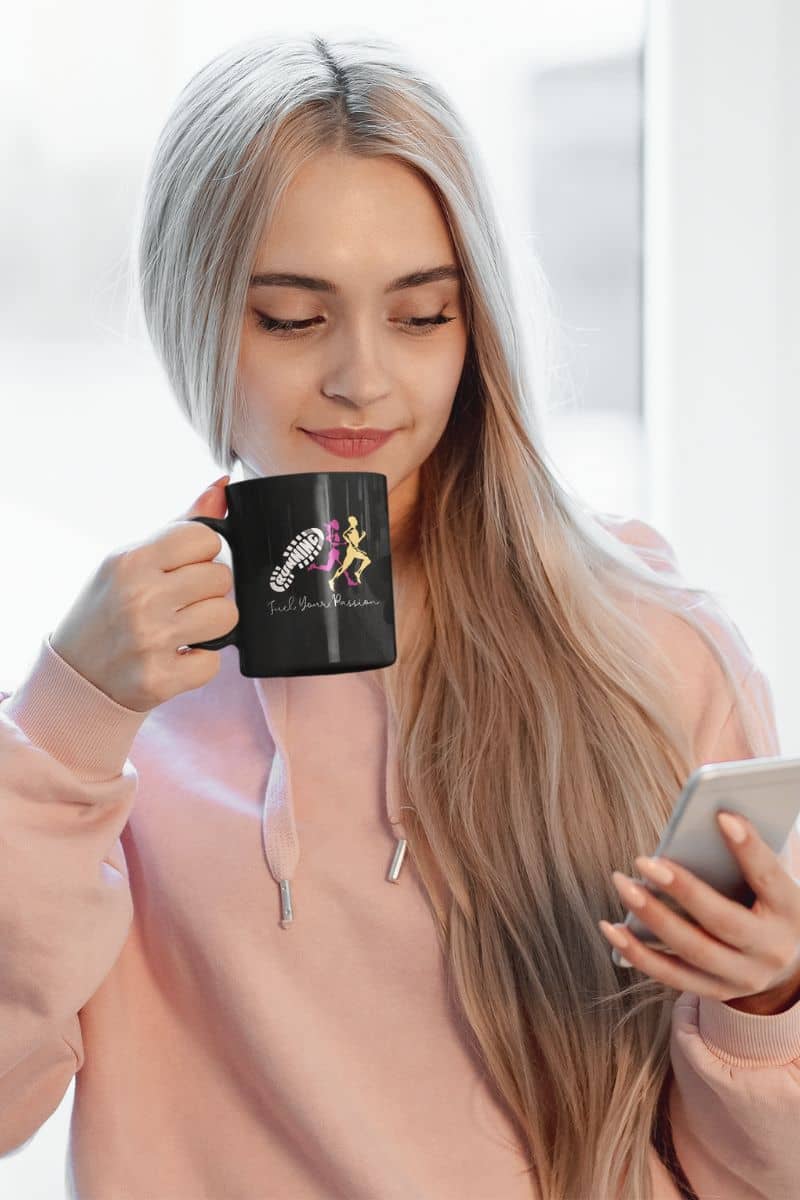 Fuel your passion coffee mug with the girl looking at her phone while holding a cup of coffee in her hand