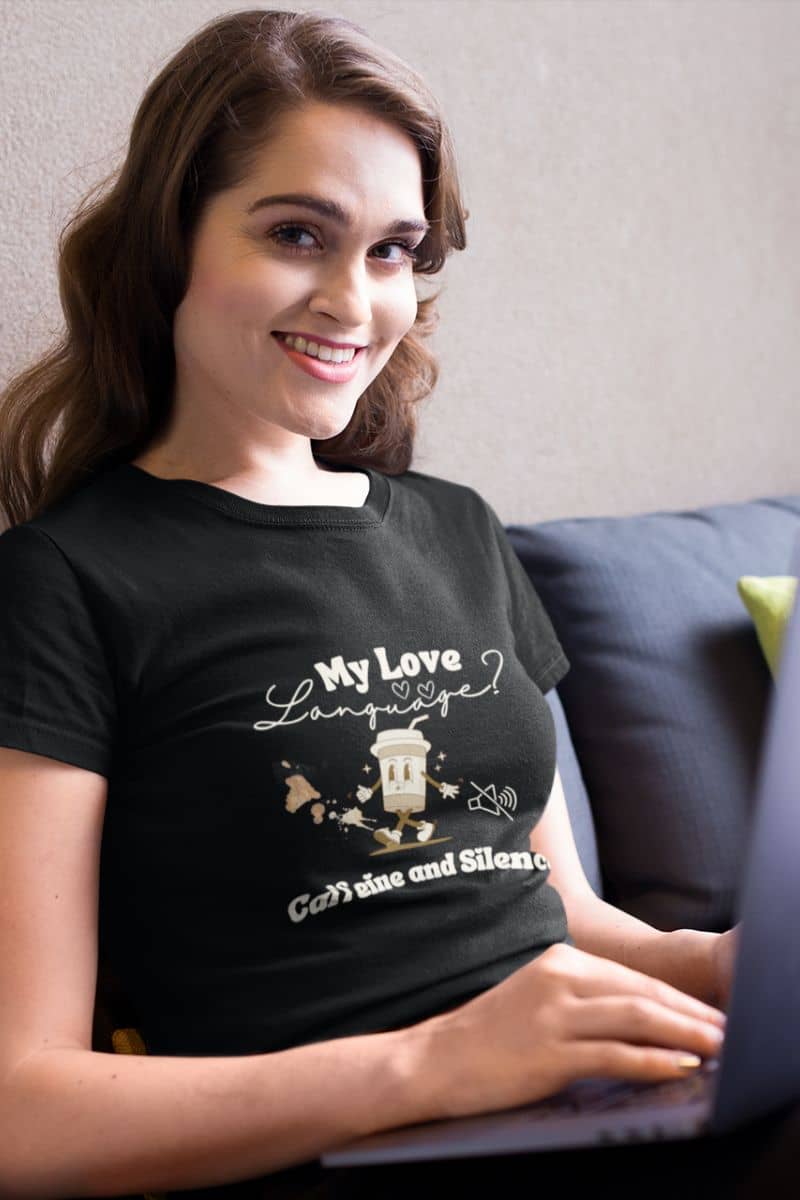 Funny coffee lover t-shirt with a girl sitting on the sofa working
