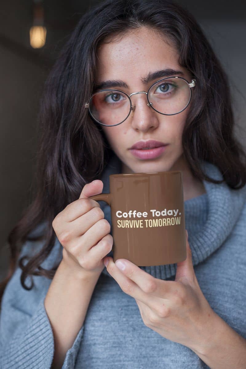 Funny latte mug with a woman holding a mug with 'Coffee Today, Survive Tomorrow' text