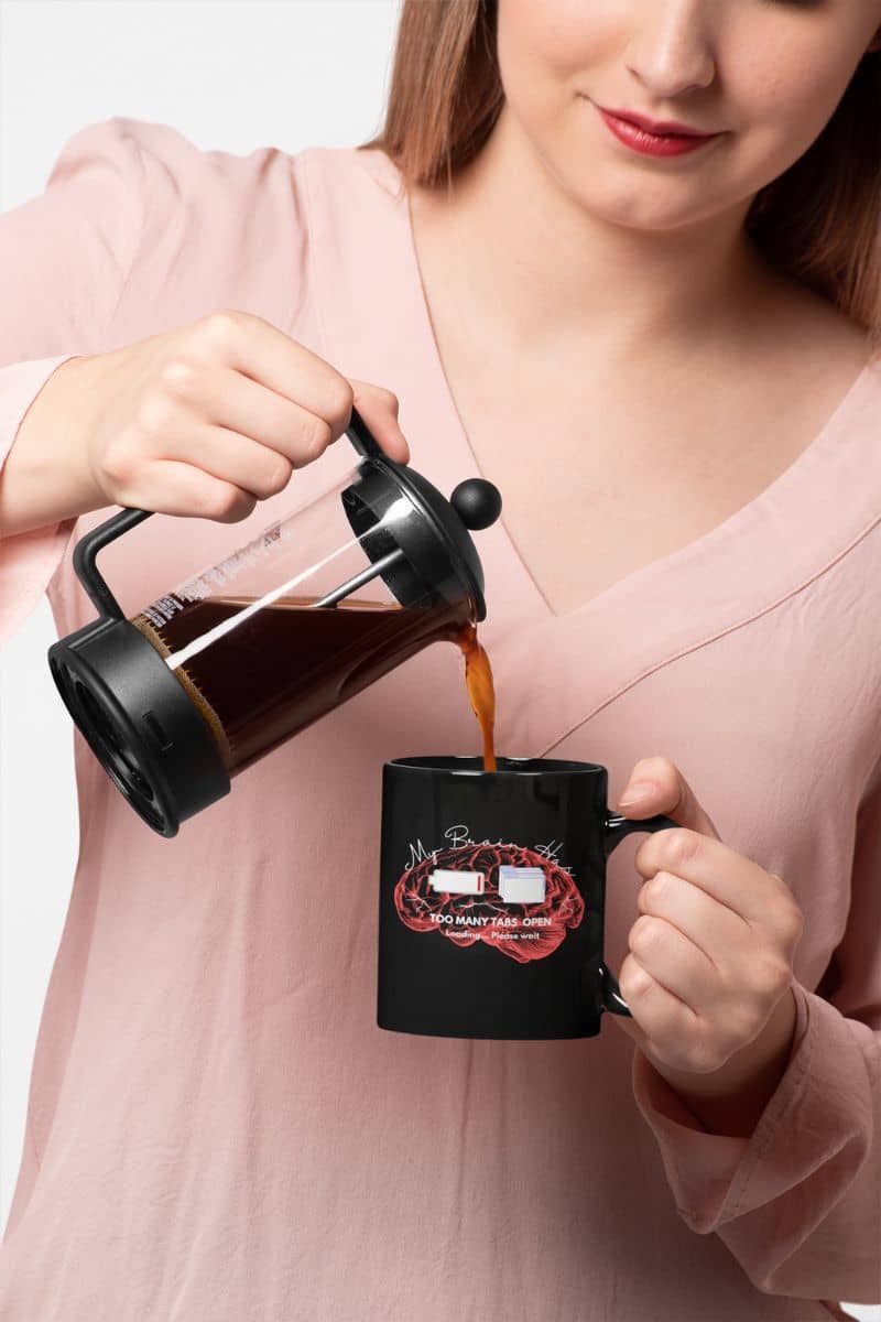 Funny mental overload coffee mug with a girl pouring coffee into her cup