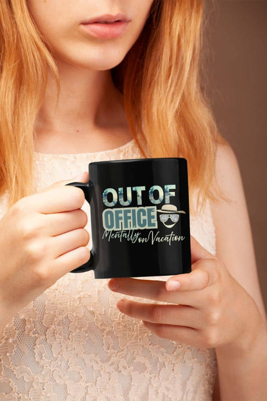 Funny office mug with a blonde girl holding a cup of coffee in front of her chest
