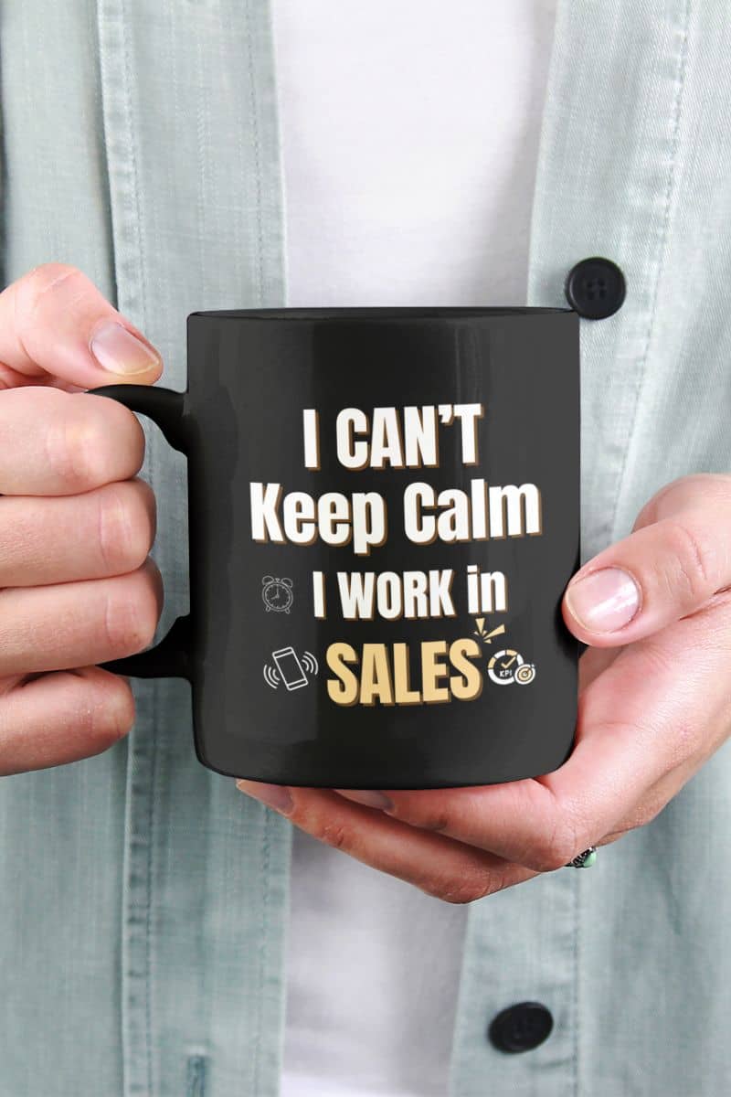 Funny sales coffee mug with the girl in the blue jacket holding a cup in front of her chest