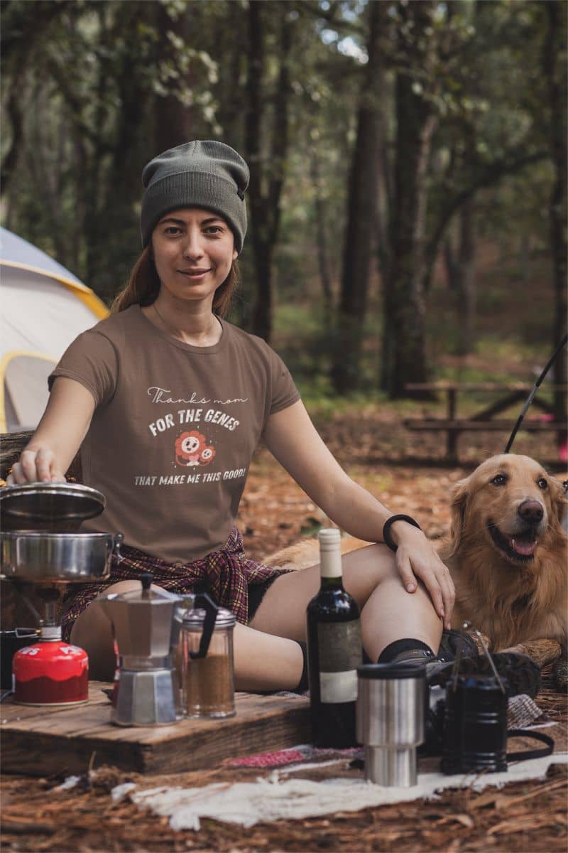 Funny t-shirt with a girl cooking while camping in the woods