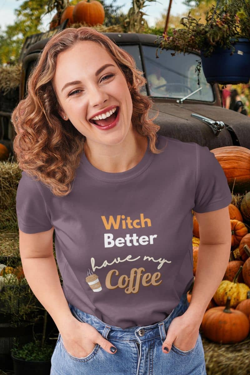 Funny witch coffee shirt with a woman wearing a t-shirt with 'Witch better have my coffee' text in a pumpkin patch.