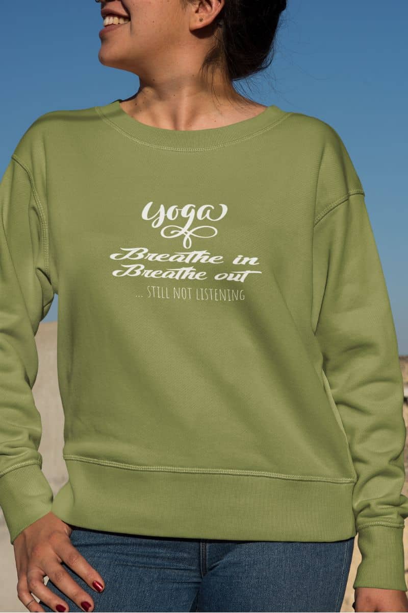 Funny yoga sweatshirt for women with the girl standing posing and looking to one side