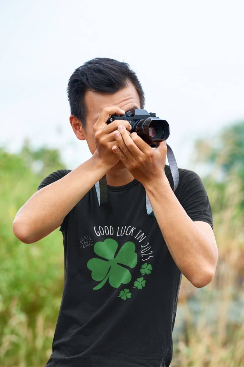 Good Luck in 2025 T-Shirt with a guy taking pictures while traveling