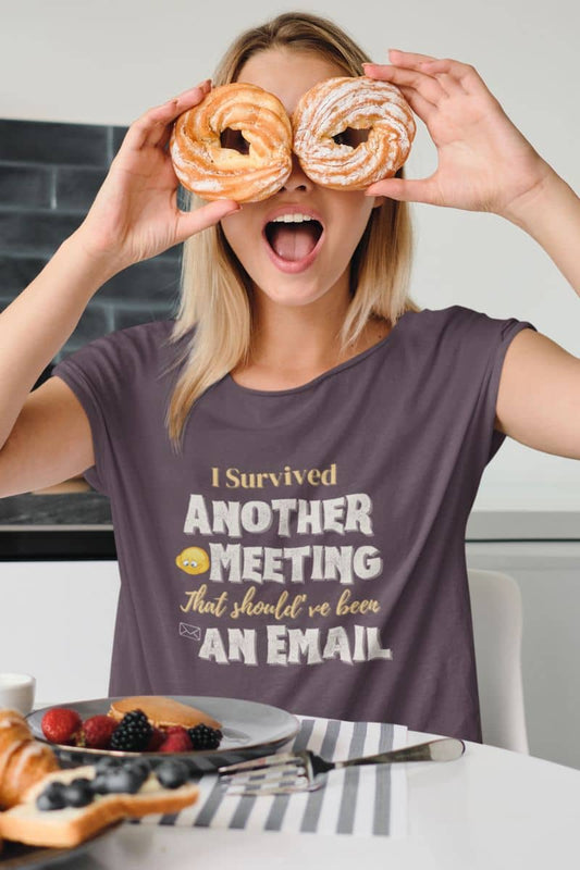 Graphic t-shirt with the girl using 2 cakes to cover her eyes while eating breakfast