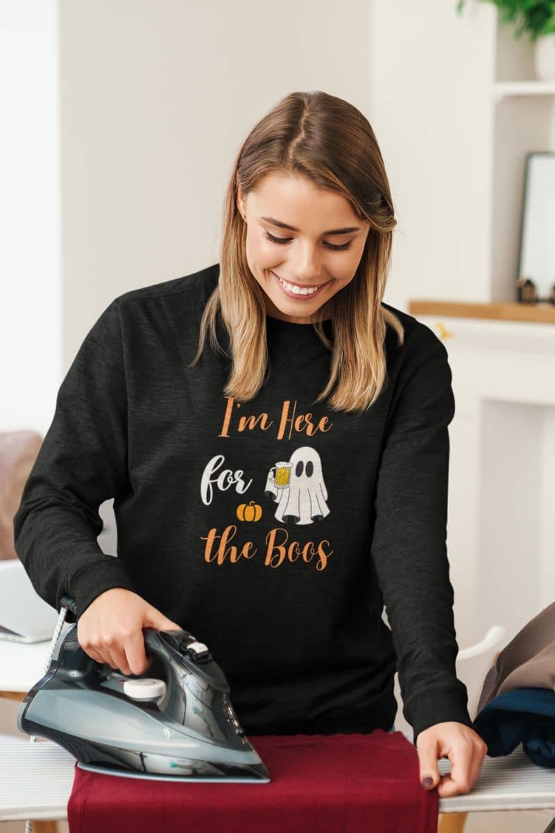 Halloween party sweater featuring a girl with text 'I’m Here for the Boos' on a white background