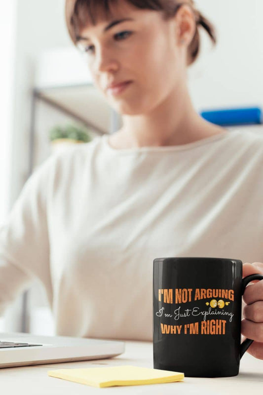 Hilarious coffee mug for work with a girl sitting working on a laptop while holding a glass of water