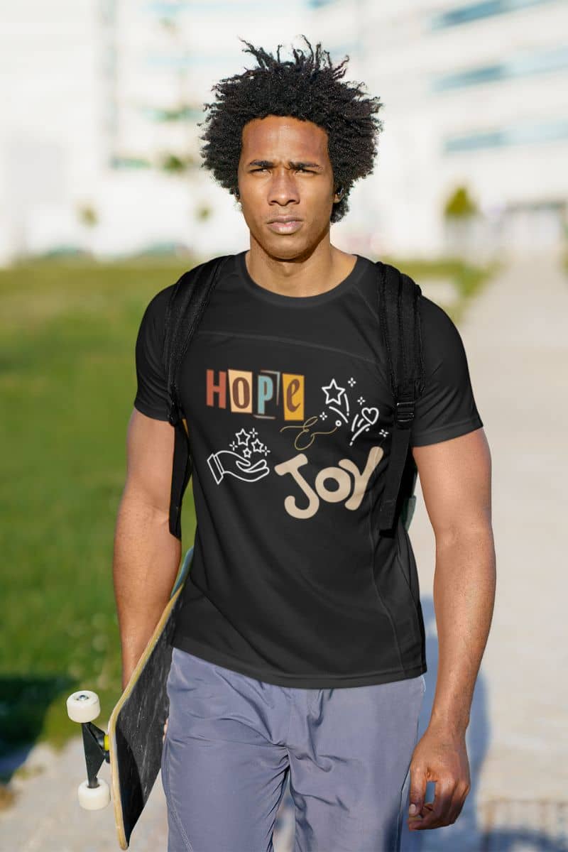 Hope and Joy T-Shirt with a man carrying a skateboard with him