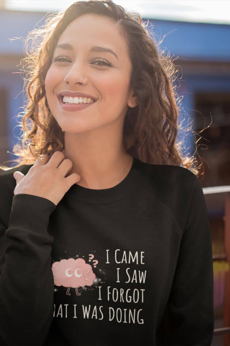 Humorous sweatshirt with a girl posing in the morning sunlight