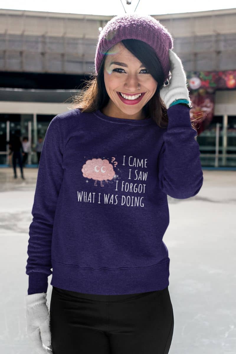 Humorous sweatshirt with a girl playing skiing in the rink