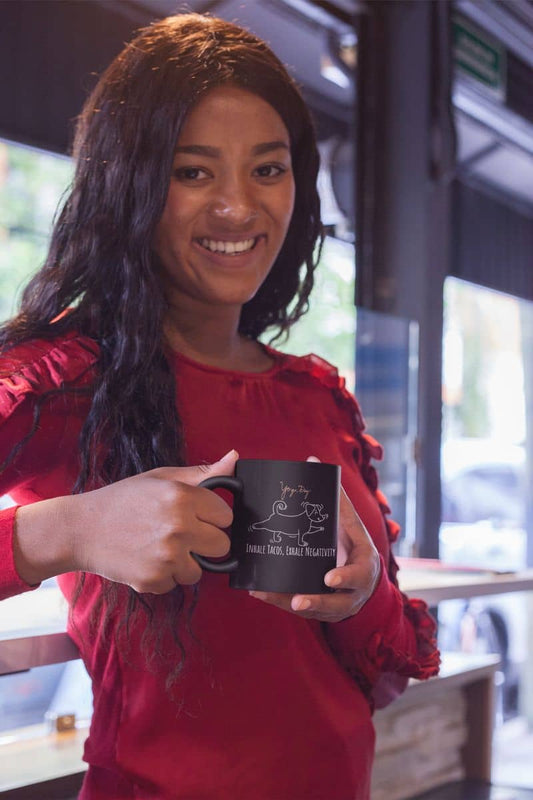Inhale tacos, exhale negativity yoga mug with a girl standing and holding a cup with a bright smile