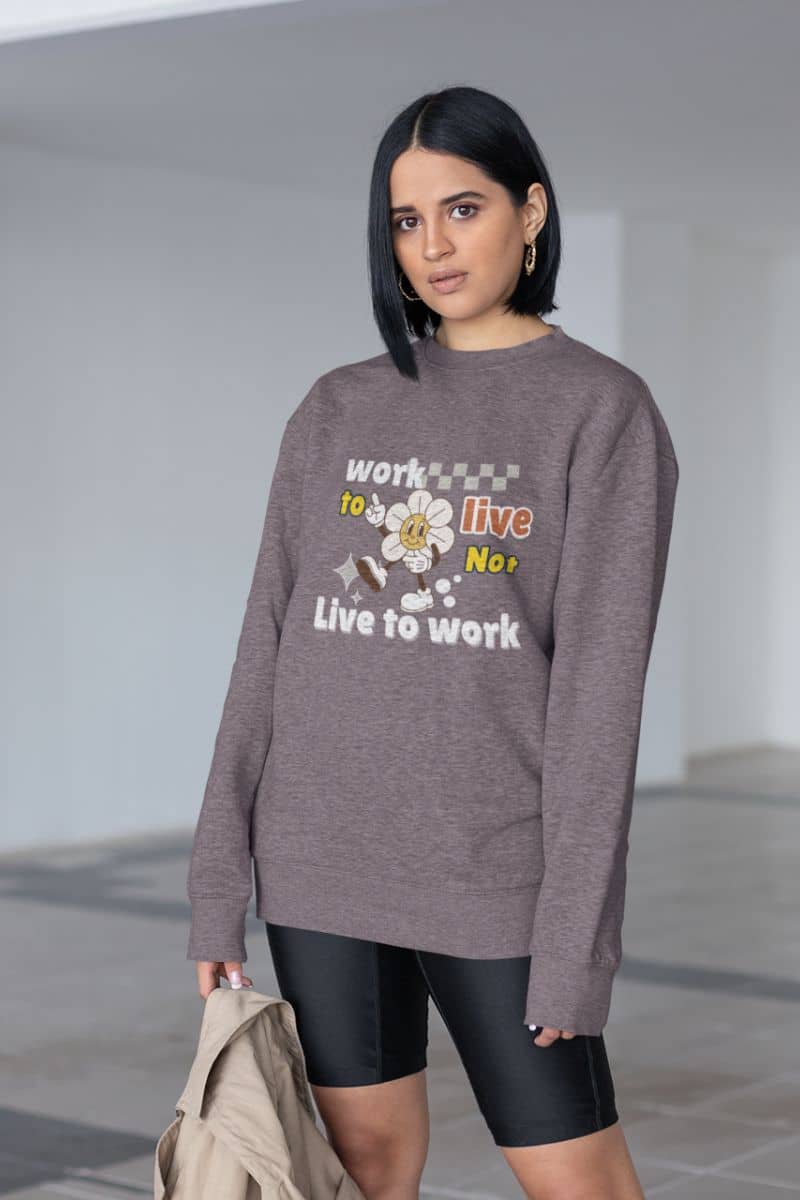 Inspirational sweatshirt with a short-haired girl wearing a sweatshirt and short sweatpants holding a jacket standing and posing in the underground parking lot