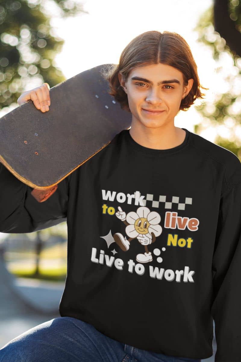 Inspirational sweatshirt with a young man carrying a skateboard on his shoulder