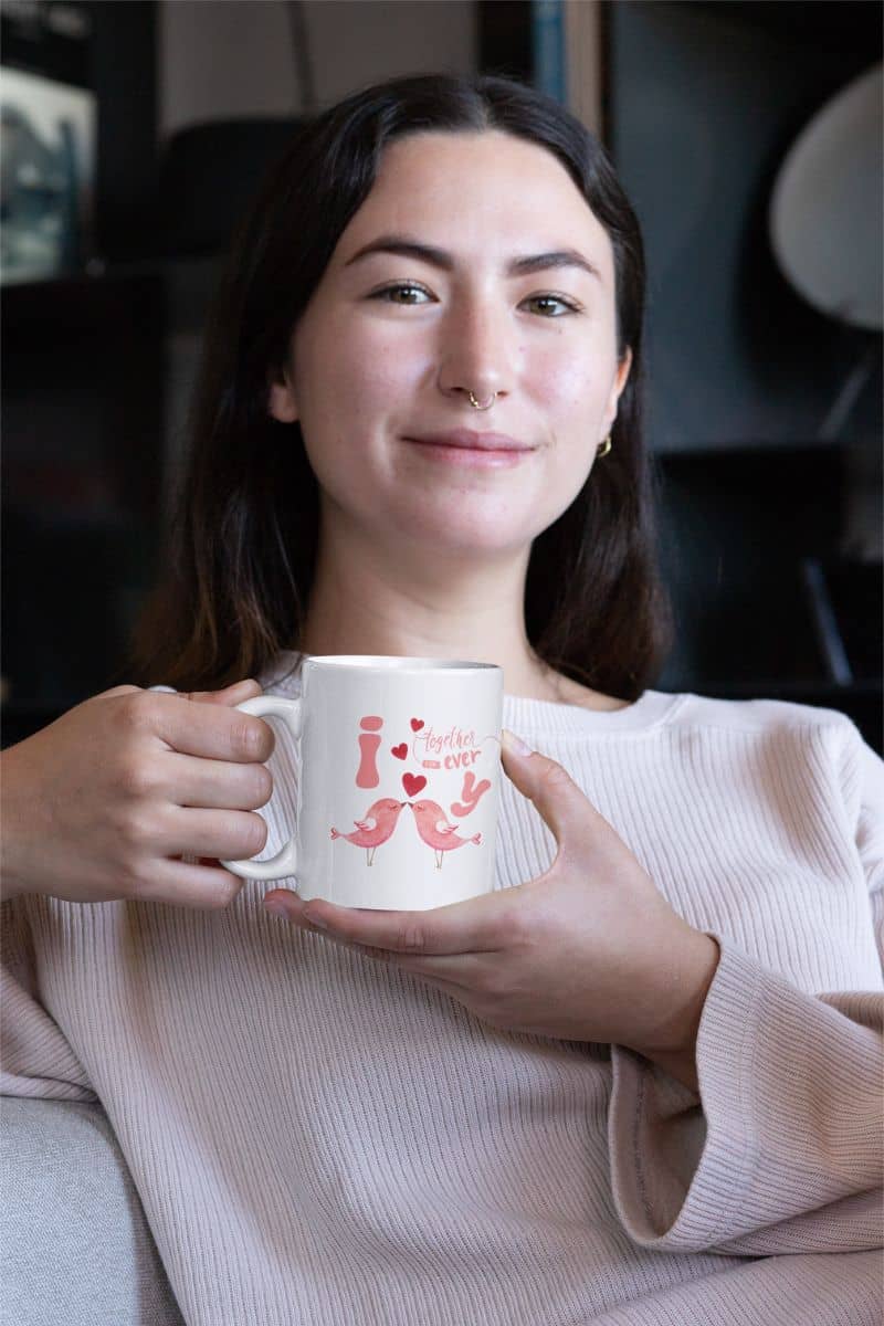 Love birds forever mug with a young girl smiling with a cup of coffee in her hand