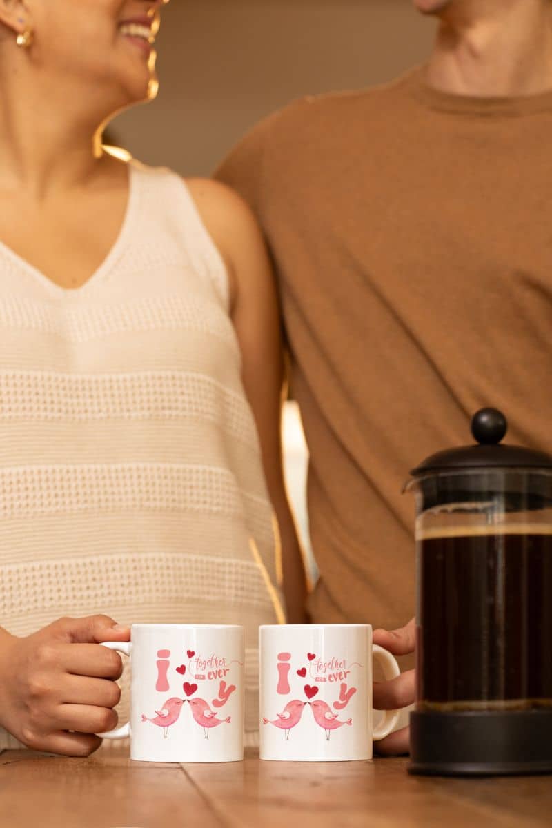 Love birds forever mug with a couple chatting happily while making coffee
